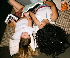 two friends reading books
