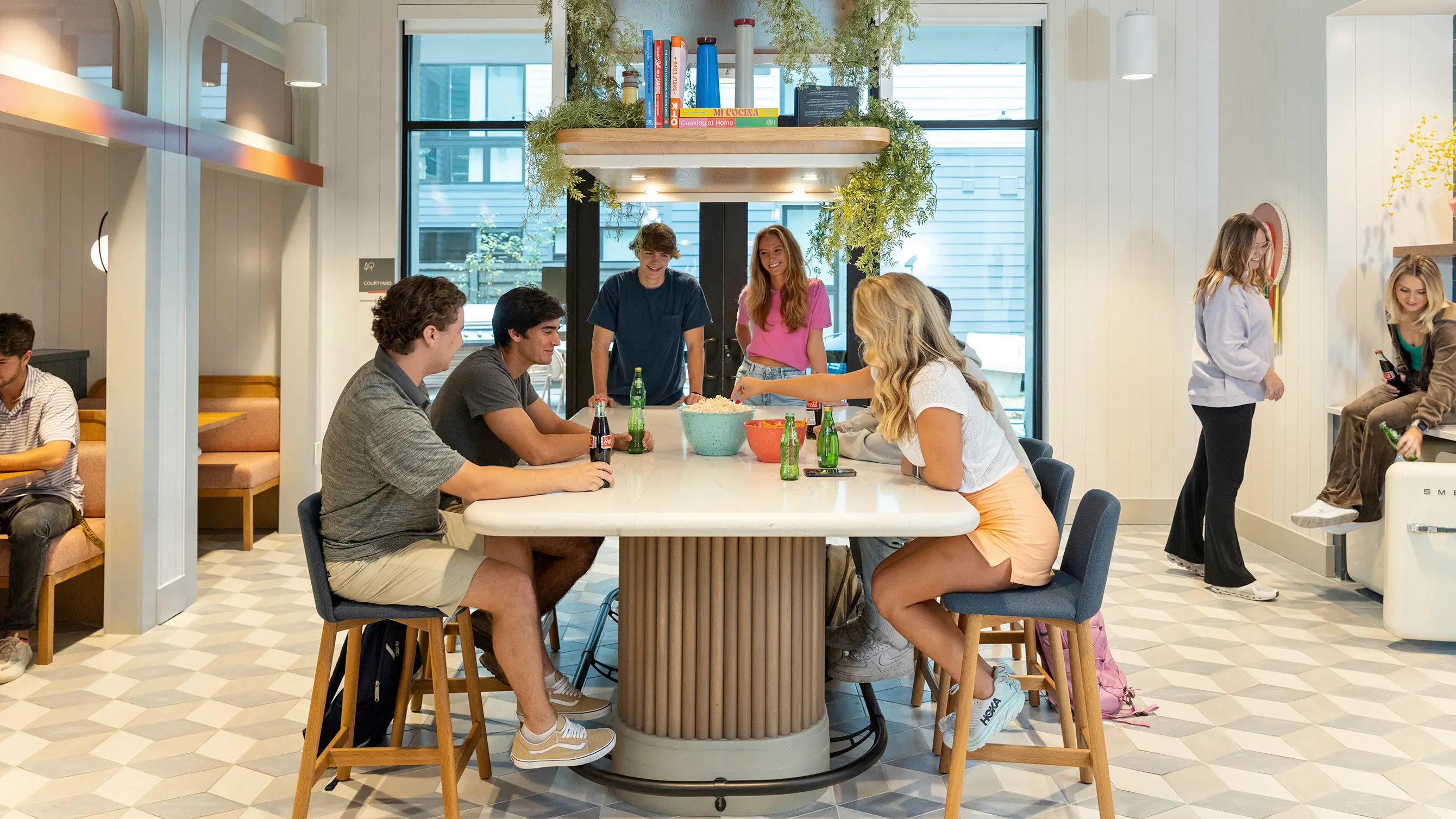 a group of friends sitting at a table