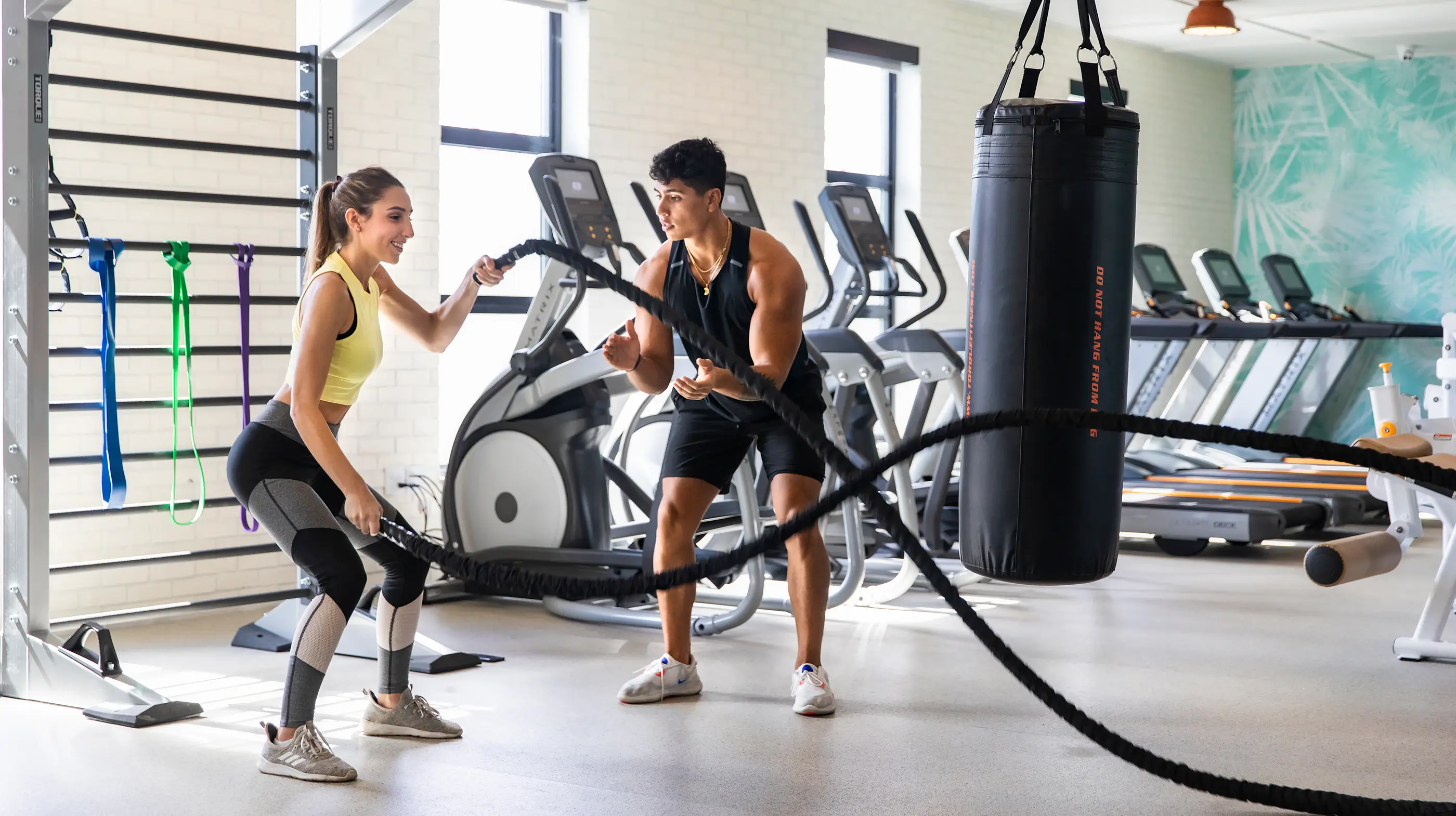 two people working out in the gym